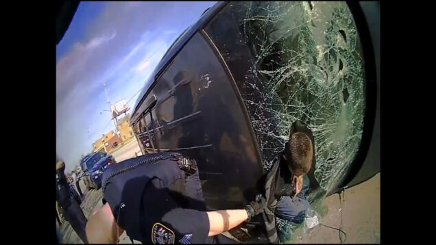 Cop-Gets-Dragged-in-Chase-with-Police-Sirens-On