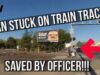 Heroic-Officer-saves-man-from-railroad-tracks-whose-wheelchair-was-stuck-on-the-tracks