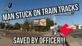 Heroic-Officer-saves-man-from-railroad-tracks-whose-wheelchair-was-stuck-on-the-tracks