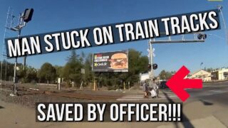 Heroic-Officer-saves-man-from-railroad-tracks-whose-wheelchair-was-stuck-on-the-tracks